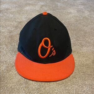 Black and Orange Baseball Cap, 7 7/8 head size. In excellent shape